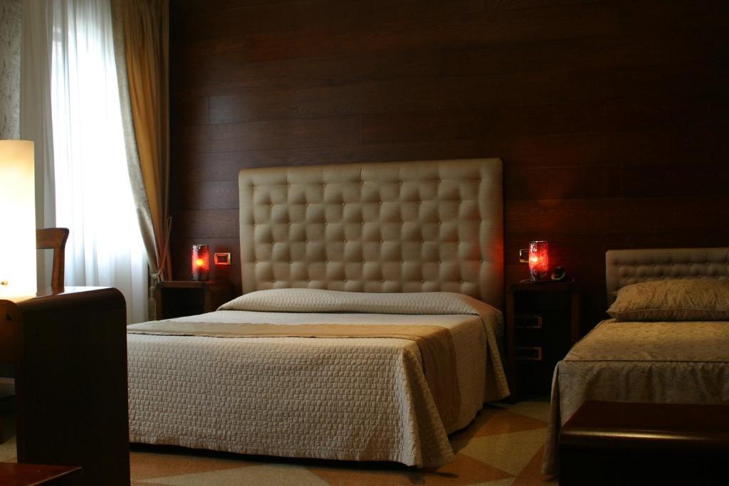 Hotel Abbazia Венеция Номер фото